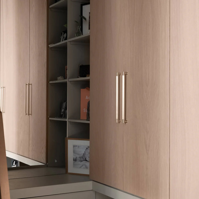 Brass Buster + Punch Linear Pull Bar handles on luxury wardrobe doors