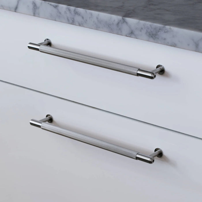 Close up of Buster + Punch Linear Pull Bar handle in Steel finish
