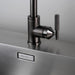 Close-up of Buster + Punch gun metal kitchen faucet handle and knurled detailing