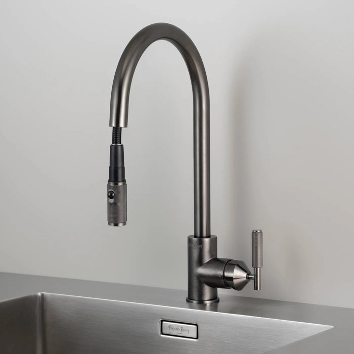 Front view of Buster + Punch gun metal kitchen faucet with pull-out spray