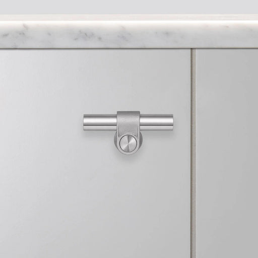 Horizontal view of Buster + Punch T-Bar CAST cabinet knob in steel finish