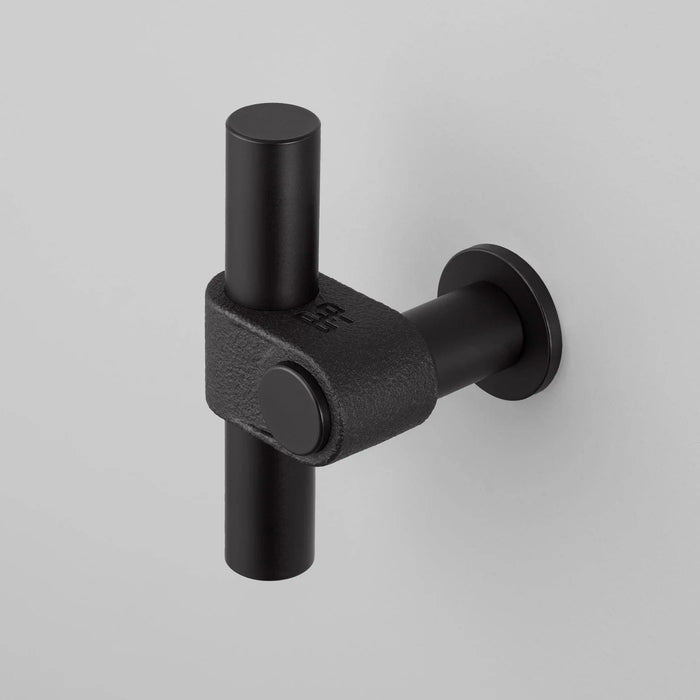 Close-up of Buster + Punch T-Bar CAST cabinet knob in Welders Black finish