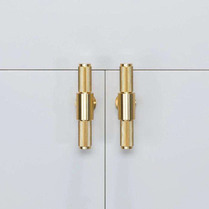 Pair of Buster + Punch T-Bar Cross cabinet knobs in Brass finish