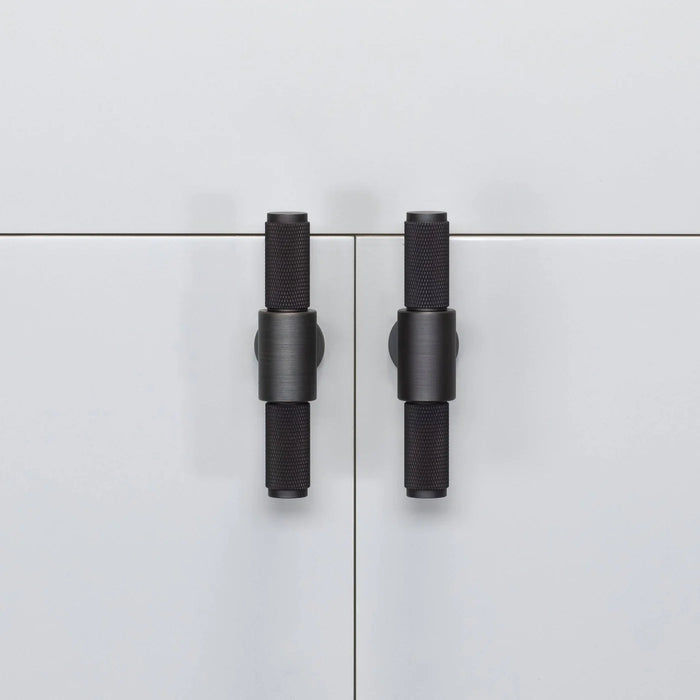 Pair of Buster + Punch T-Bar Cross cabinet knobs in Smoked Bronze finish