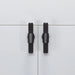 Pair of Buster + Punch T-Bar Cross cabinet knobs in Smoked Bronze finish