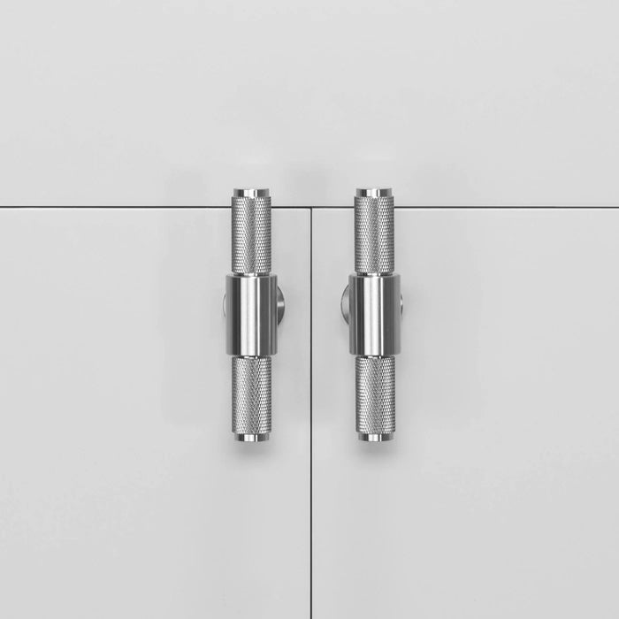 Pair of Buster + Punch T-Bar Cross cabinet knobs in Steel finish