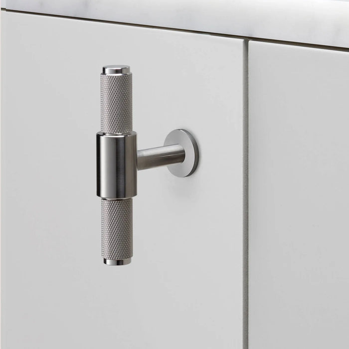 Buster + Punch T-Bar Cross cabinet knob in Steel finish mounted on cabinetry