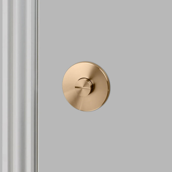 Rear view of Buster + Punch Cross thumbturn lock in brass finish