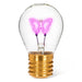 Butterfly neon LED light bulb with pink glow filament in clear glass on white background