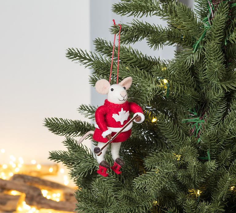 Hockey mouse ornament hanging on Christmas tree festive decor