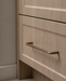 CBH 220 bar pull in antique brass finish installed on light wood cabinet drawer