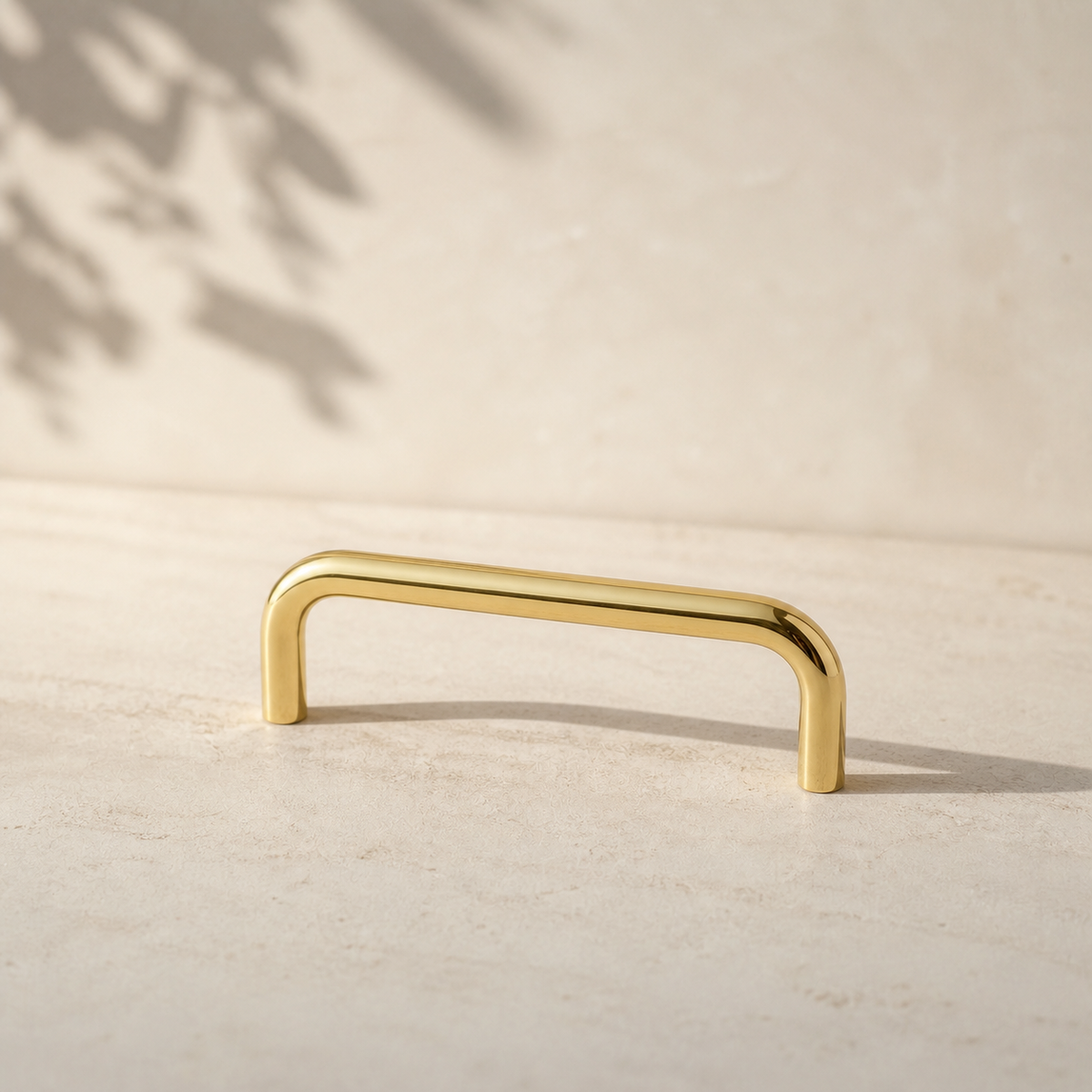 CBH 220 cabinet bar pull in bright brass finish on neutral background minimal product shot