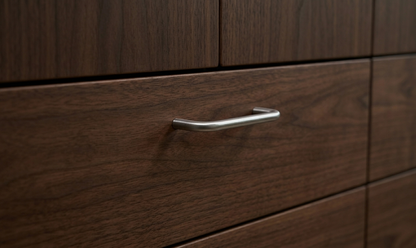 CBH 220 bar pull in bright chrome finish installed on dark wood drawer front