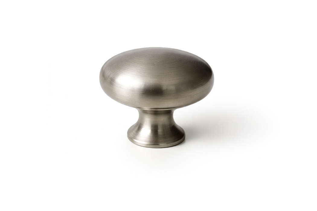 CBH 502 dome cabinet knob in pewter finish angled view