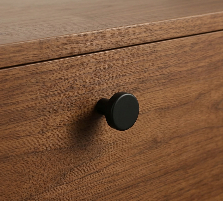 CBH 503 Minimalist Round Cabinet Knob in Flat Black finish installed on wood cabinetry