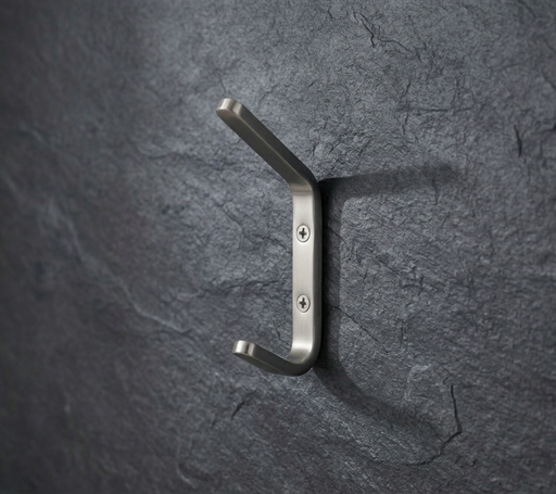 CBH 61 rounded minimalist coat hook installed on textured dark wall modern wall hook design