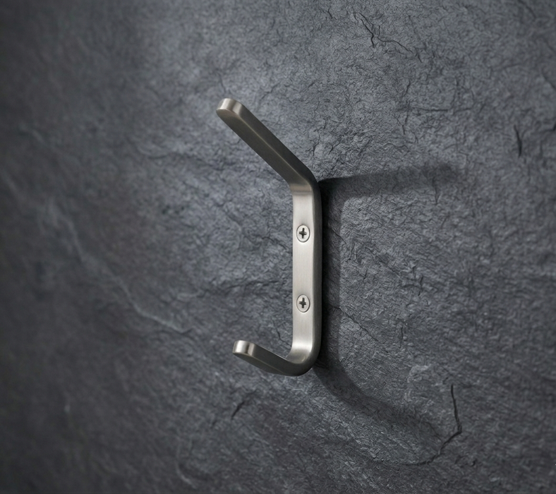 CBH 61 rounded minimalist coat hook installed on textured dark wall modern wall hook design