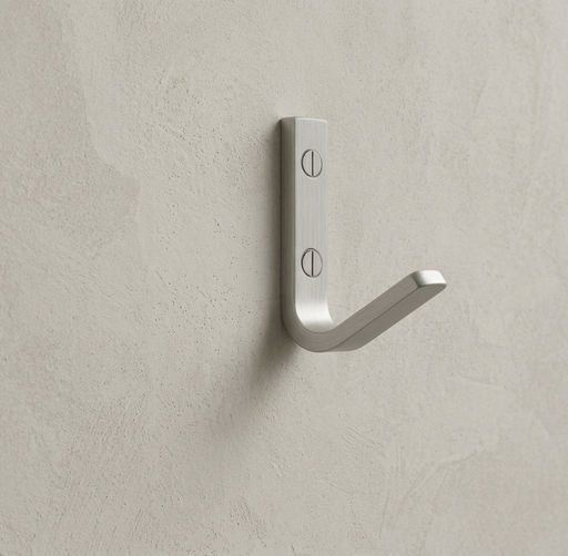 CBH 62 wall hook in satin chrome finish installed on textured beige wall minimal modern hook