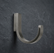 Pewter wall hook CBH 66 installed on dark wall minimalist curved coat hook