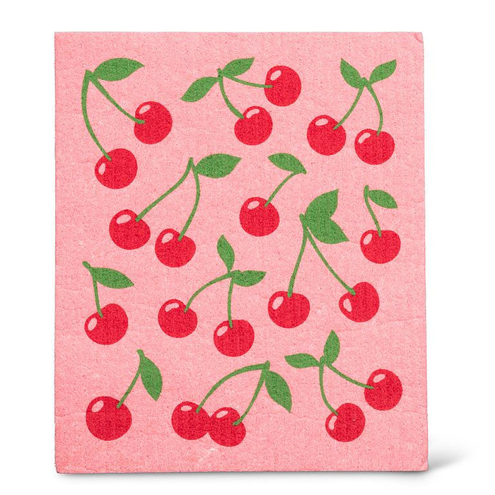 cherries dishcloth pink background close view