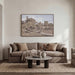 Everren Andora oversized landscape canvas displayed above a neutral living room sofa