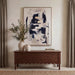Everren Pietro black and beige abstract canvas displayed above a wooden console