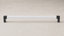 Front view of the Häfele Elite Leather cabinet handle in black with Winter faux leather insert.