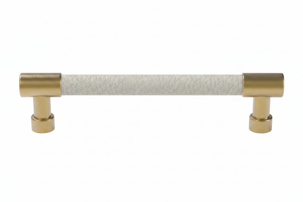 Häfele Elite Leather cabinet handle in matte gold with Winter faux leather, 152 mm overall length and 128 mm centre-to-centre.