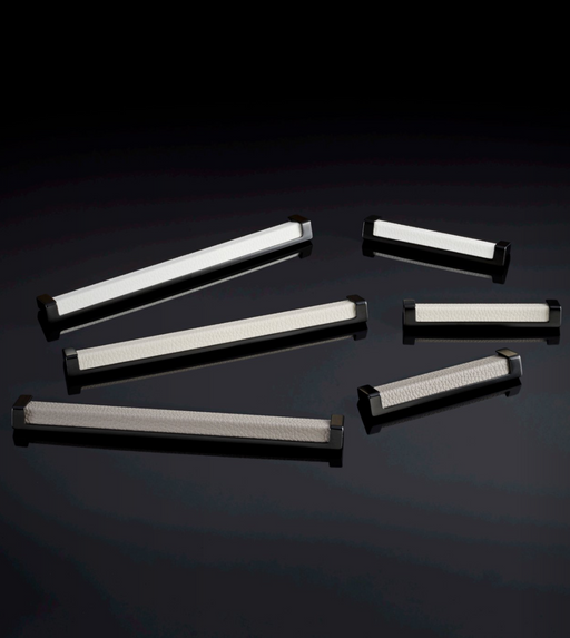Häfele Elite Leather recessed cabinet handle collection in matte black with Winter, Oyster, and Pewter faux leather inserts.