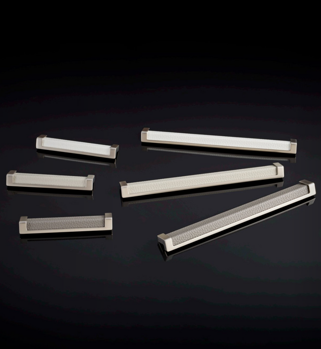 Häfele Elite Leather recessed cabinet handle collection in matte nickel featuring Winter, Oyster, and Pewter faux leather inserts.