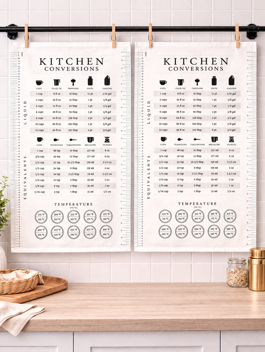 Set of 2 kitchen conversion cotton towels hanging in kitchen with cooking measurement chart design