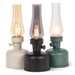 Lantern LED lamps in black, cream, and green finishes with smoke glass chimneys