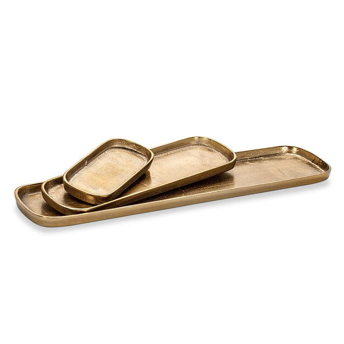 Large gold oval tray styled with accessories decorative tabletop tray