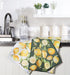 Lemon kitchen towels in modern kitchen setting bright citrus dish towels near sink