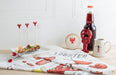 Lobster kitchen towel styled in modern kitchen setting with seafood elements