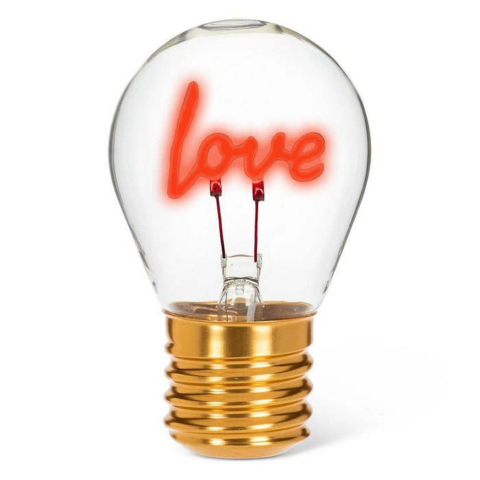 Love neon LED light bulb with red glowing filament in clear glass on white background