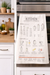 Measurement conversion kitchen towel displayed in modern kitchen for cooking reference