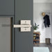 Contemporary dark gray interior door featuring an installed Weiser Montreal Satin Nickel square lever.