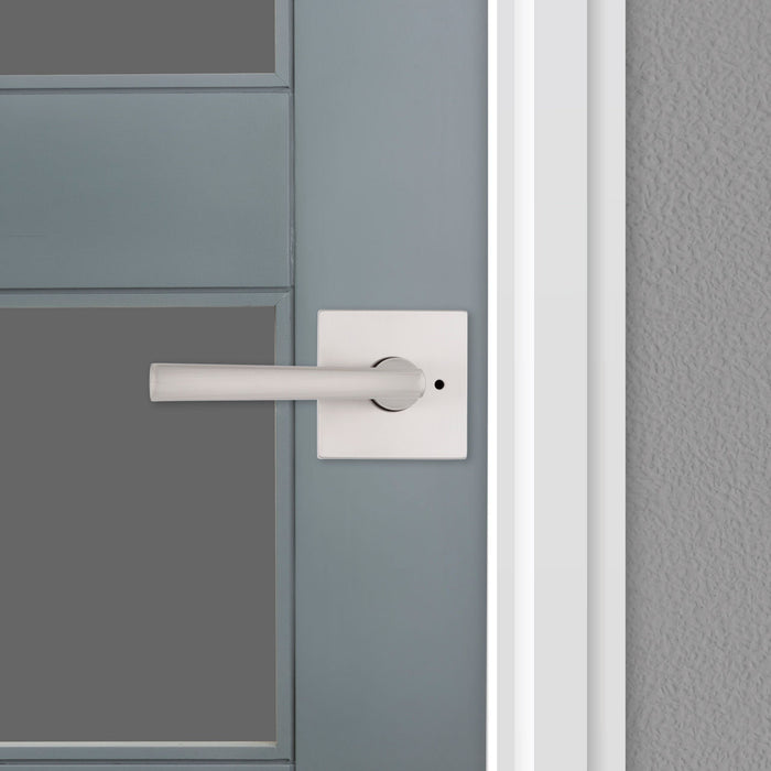Modern interior door with Weiser Montreal square privacy lever handle in satin nickel