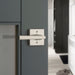 Weiser Montreal square privacy door lever installed on modern bedroom door