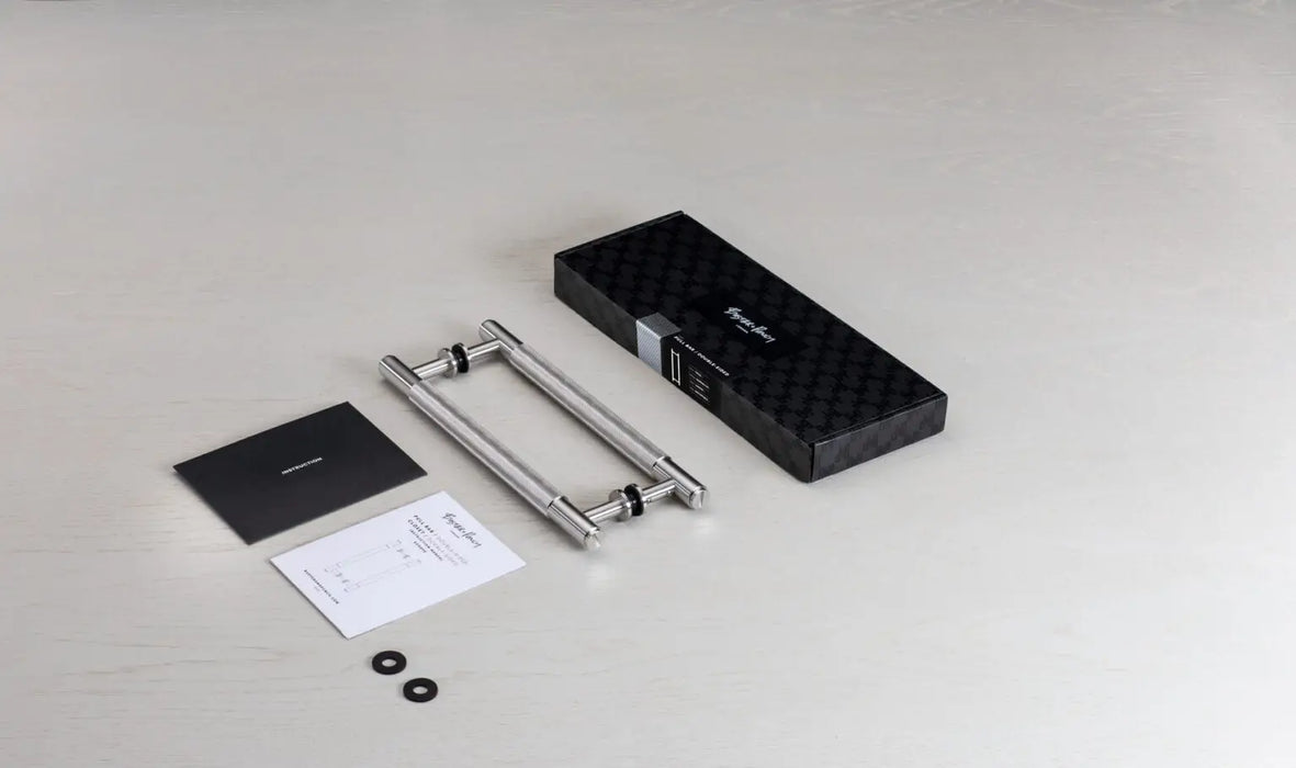 Buster + Punch Double-Sided Pull Bar Cross packaging with installation hardware and accessories