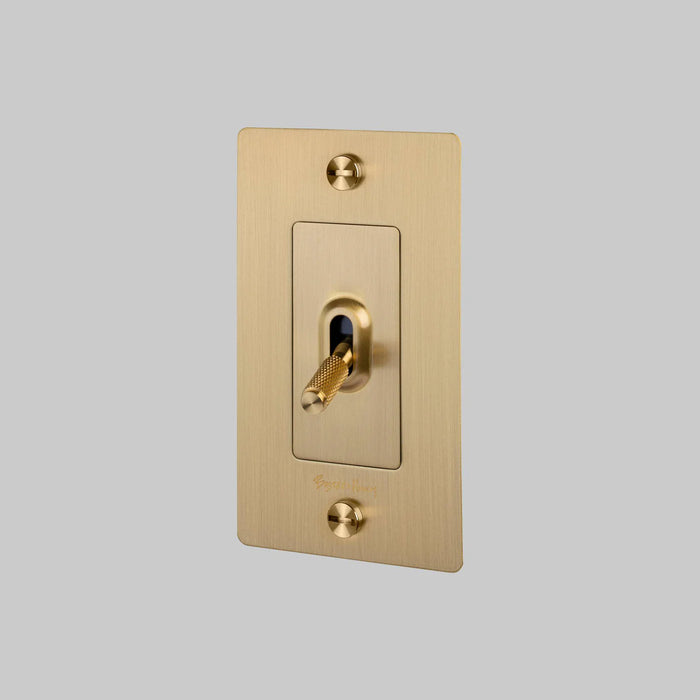 Buster + Punch 1-Gang Toggle Switch – Cross - Brass / With Logo - 1G Toggle