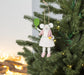 Felt pickleball mouse ornament hanging on tree holiday decor