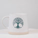 Video showing the ivory and green Tree of Life stoneware mug from multiple angles