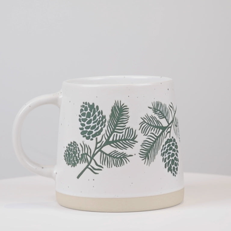 Video showing the Abbott pinecone stoneware mug from multiple angles