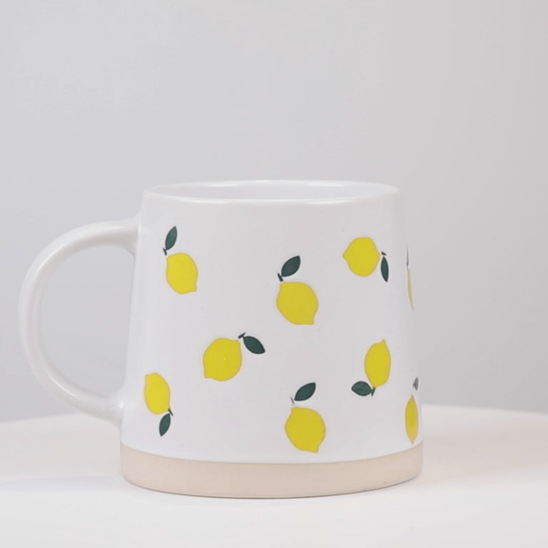 Video showcasing the Abbott wide base stoneware mug with lemon design from multiple angles