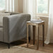 Renwil Abby marble accent table styled beside a sofa in a modern luxury living room