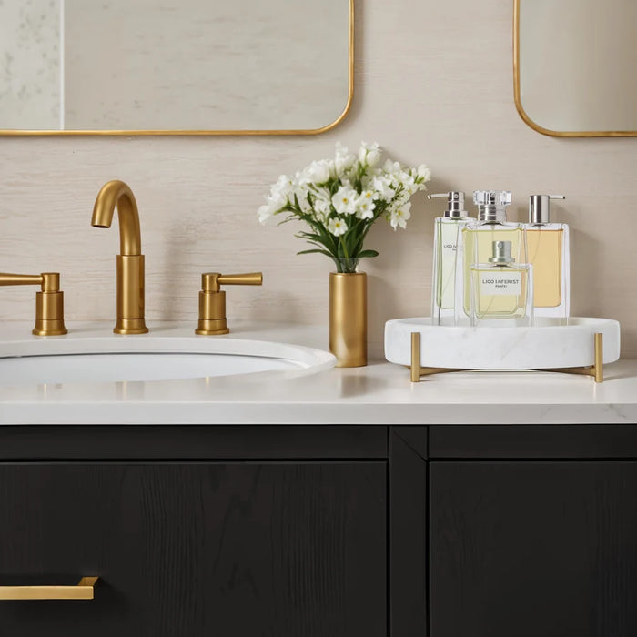 Renwil Beja white marble tray displaying perfume bottles on a bathroom vanity