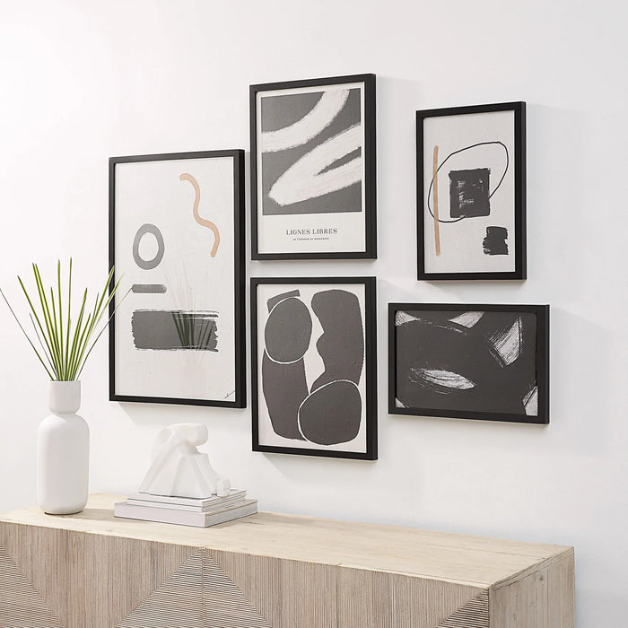 Renwil Carife five-piece framed wall art set displayed above a console table