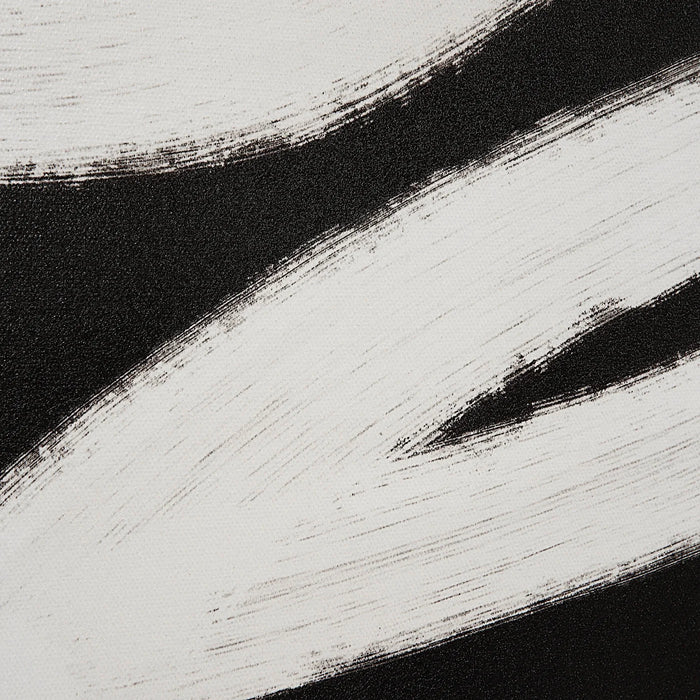 Close-up of bold white brushstrokes on black Carife abstract artwork